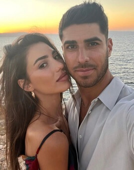 Marco Asensio with his partner, Sandra Garal. 